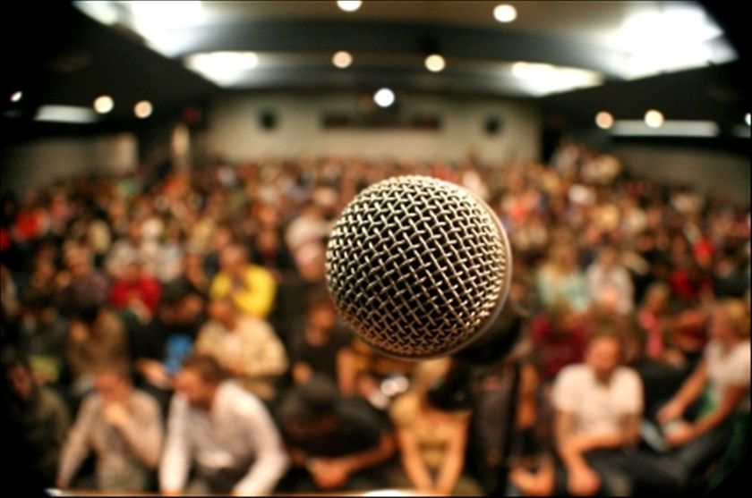 Why companies hire motivational speakers to achieve their goals?