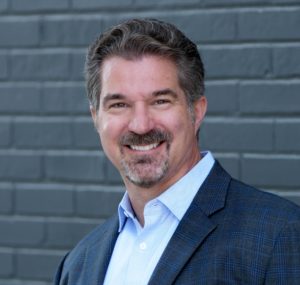 Jon Newhard Headshot, New Clinc CEO